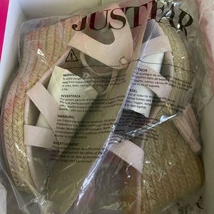 Brand New Wedge sandals.